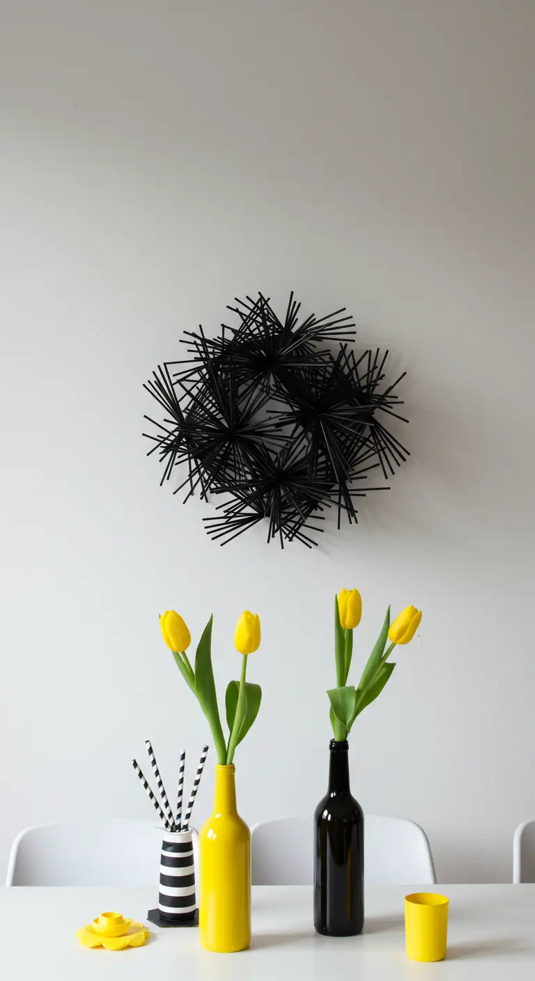 A black sculptural wall art piece made of drinking straws above a minimalist table.